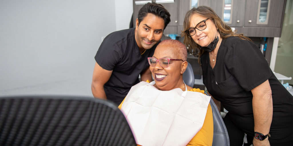 Dr. Palani with dental patient